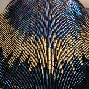 Beautiful new without tags beaded clutch purse.